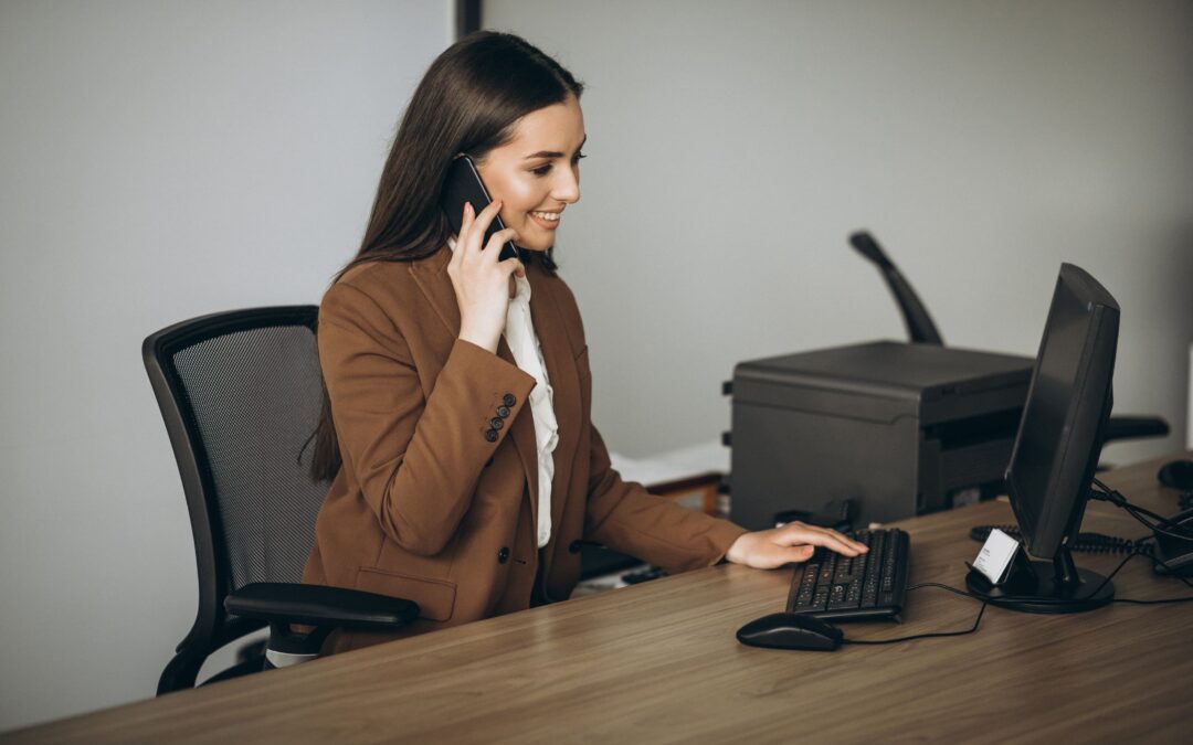 businesswomen using IP phone to contact